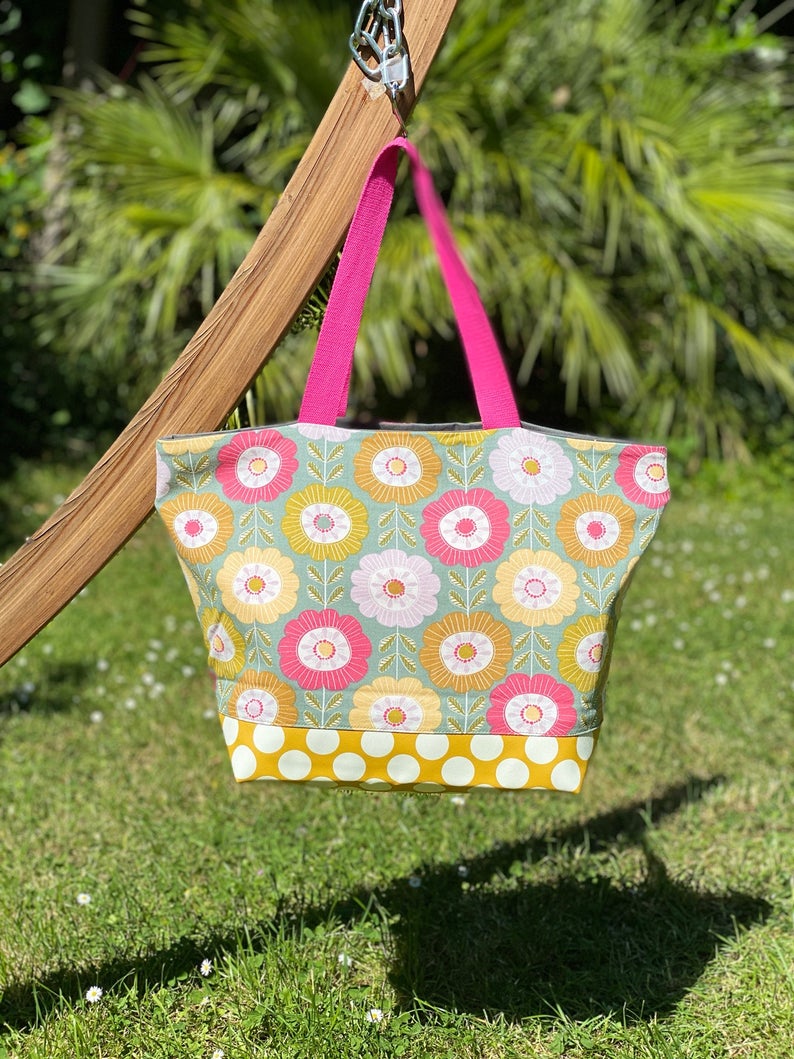 Sac ville habillé en flanelle et tissu fleuri 